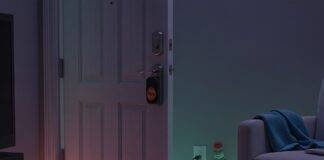 Top Smart Home Devices for 2025 (That Are Actually Worth Buying) A Cluttered Living Room with Echo, Roomba, and Yale Lock